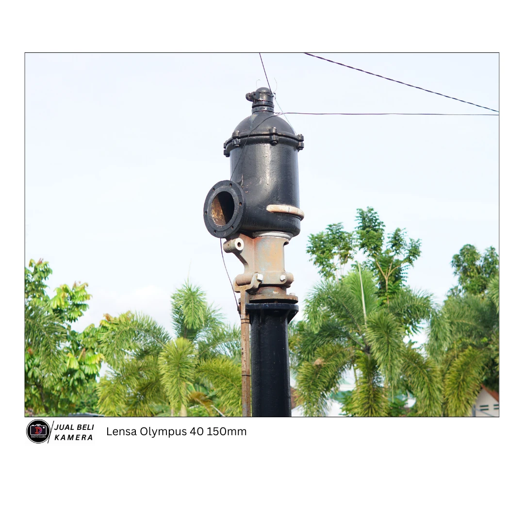 Lensa tele Olympus 40 150mm F4 - 5.6 R kondisi baik